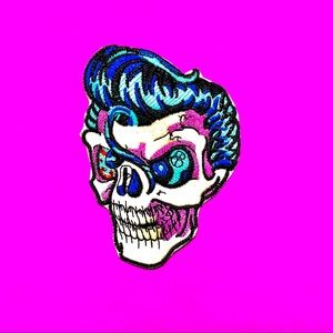 Rad vibrant skull head greaser hair iron On patch
